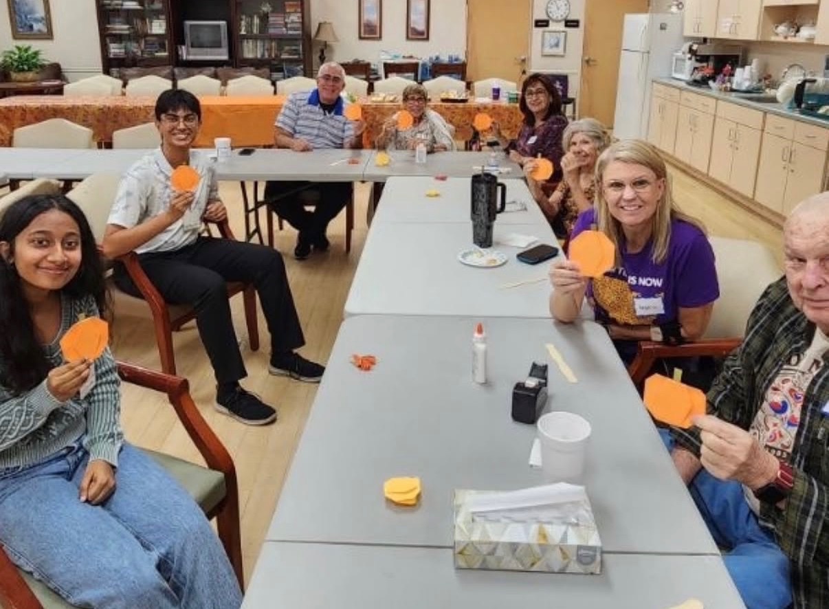 Students and seniors during an intergenerational class